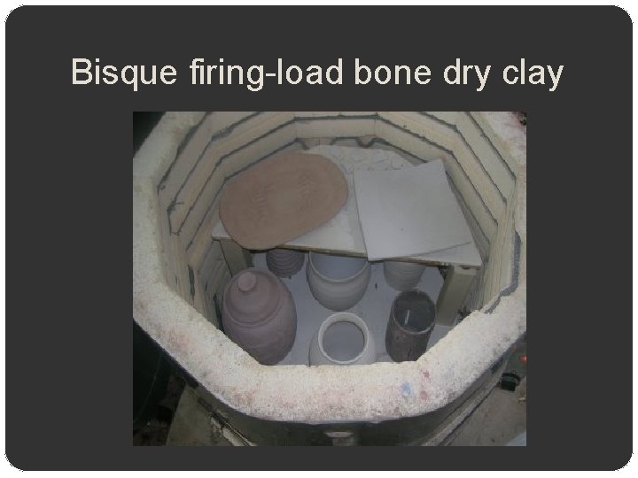 Bisque firing-load bone dry clay 