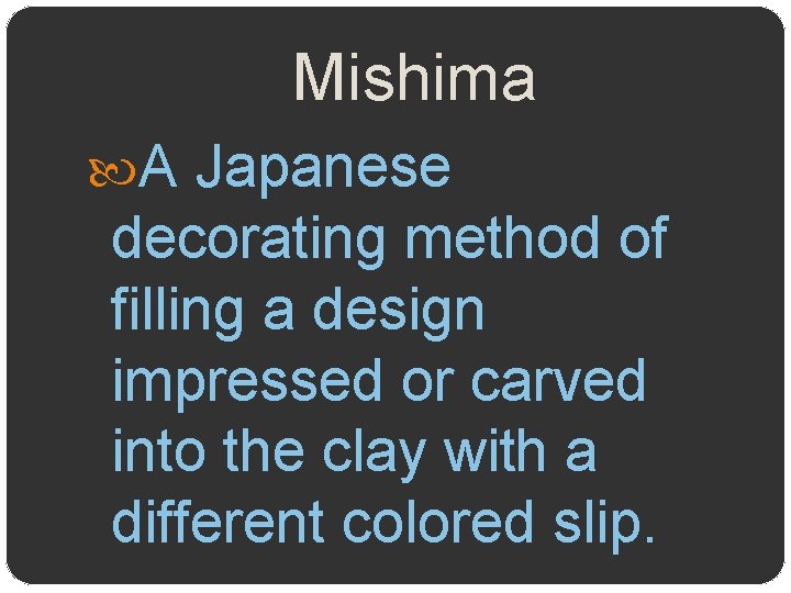 Mishima A Japanese decorating method of filling a design impressed or carved into the