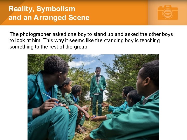 Reality, Symbolism and an Arranged Scene The photographer asked one boy to stand up