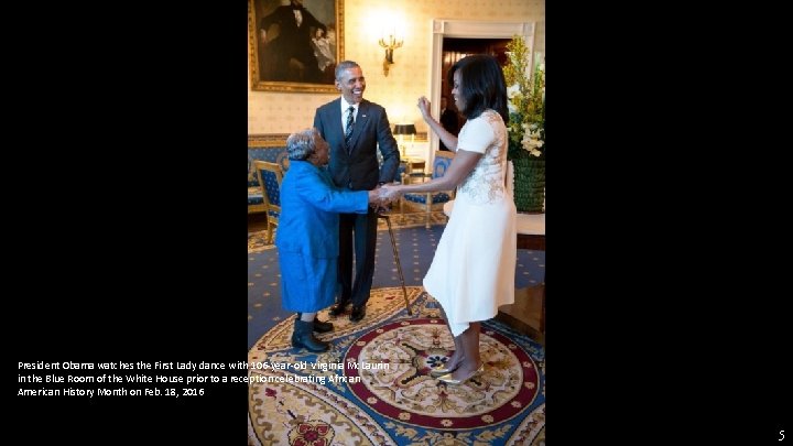President Obama watches the First Lady dance with 106 -year-old Virginia Mc. Laurin in