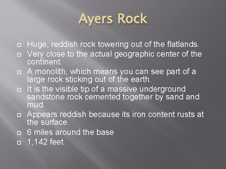 Ayers Rock Huge, reddish rock towering out of the flatlands. Very close to the