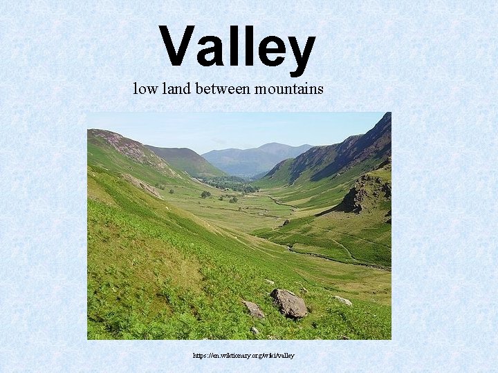 Valley low land between mountains https: //en. wiktionary. org/wiki/valley Valley low land between mountains https: //en. wiktionary. org/wiki/valley