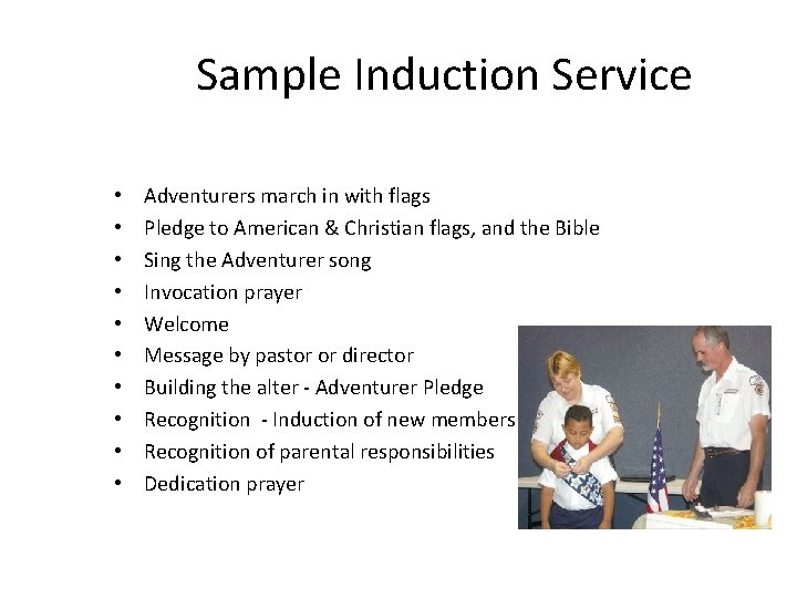 Sample Induction Service • • • Adventurers march in with flags Pledge to American