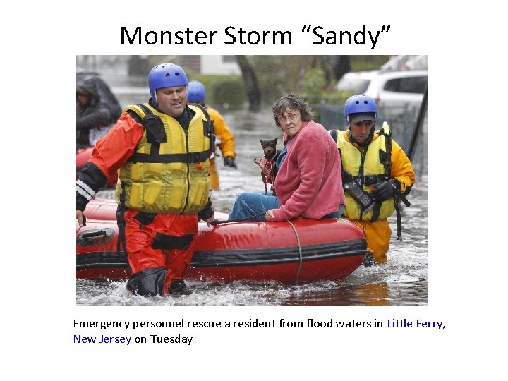 Monster Storm “Sandy” Emergency personnel rescue a resident from flood waters in Little Ferry,