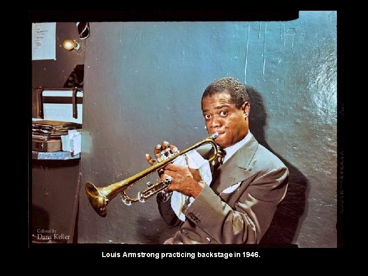 Louis Armstrong practicing backstage in 1946. 