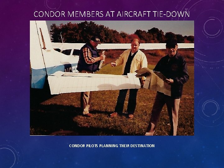 CONDOR MEMBERS AT AIRCRAFT TIE-DOWN CONDOR PILOTS PLANNING THEIR DESTINATION 