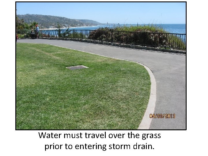 Water must travel over the grass prior to entering storm drain. 