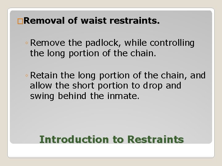 �Removal of waist restraints. ◦ Remove the padlock, while controlling the long portion of