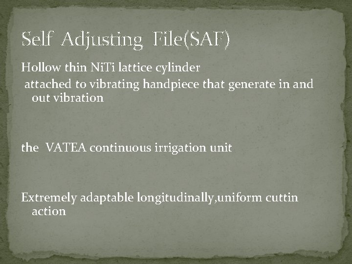 Self Adjusting File(SAF) Hollow thin Ni. Ti lattice cylinder attached to vibrating handpiece that
