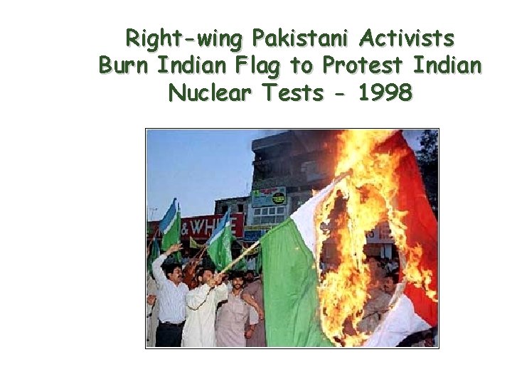 Right-wing Pakistani Activists Burn Indian Flag to Protest Indian Nuclear Tests - 1998 