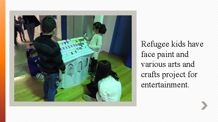 Refugee kids have face paint and various arts and crafts project for entertainment. 