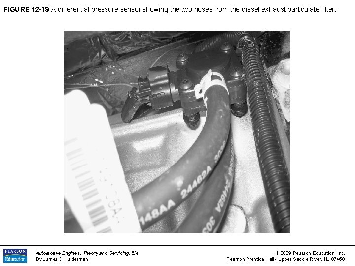 FIGURE 12 -19 A differential pressure sensor showing the two hoses from the diesel