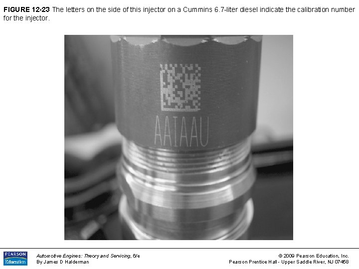 FIGURE 12 -23 The letters on the side of this injector on a Cummins