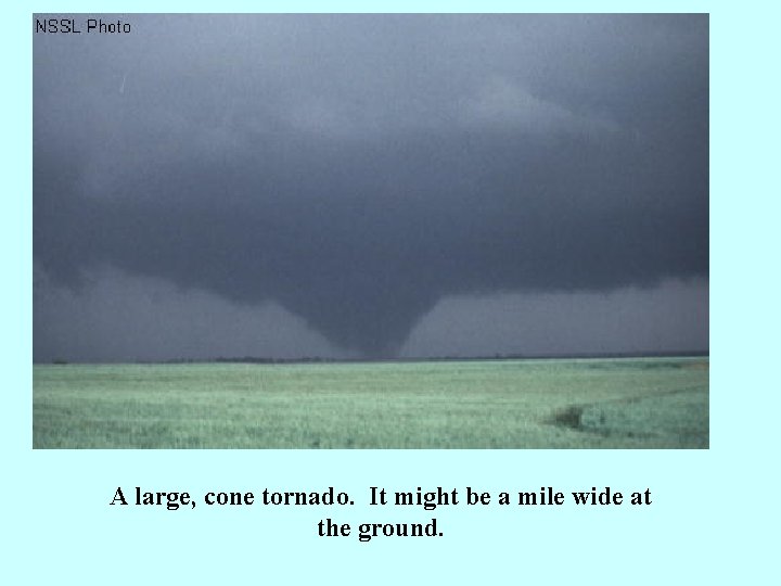 A large, cone tornado. It might be a mile wide at the ground. 