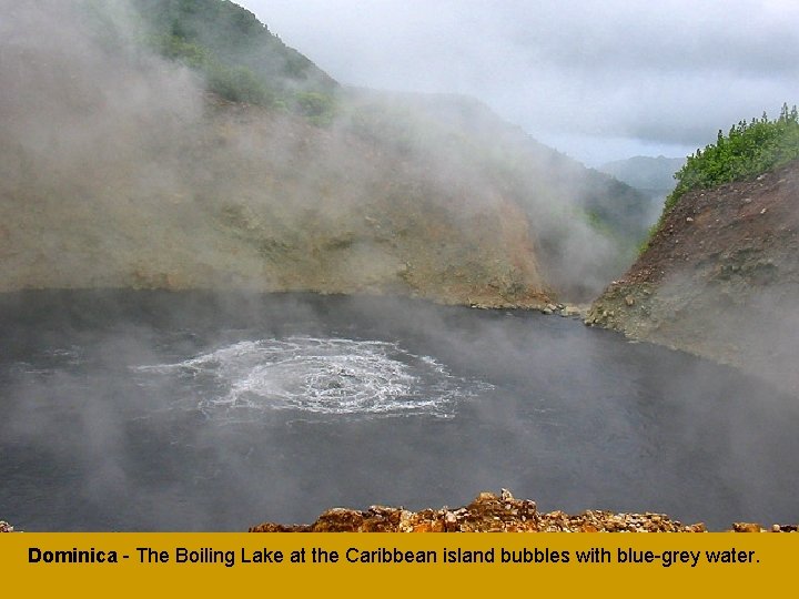 Dominica - The Boiling Lake at the Caribbean island bubbles with blue-grey water. 