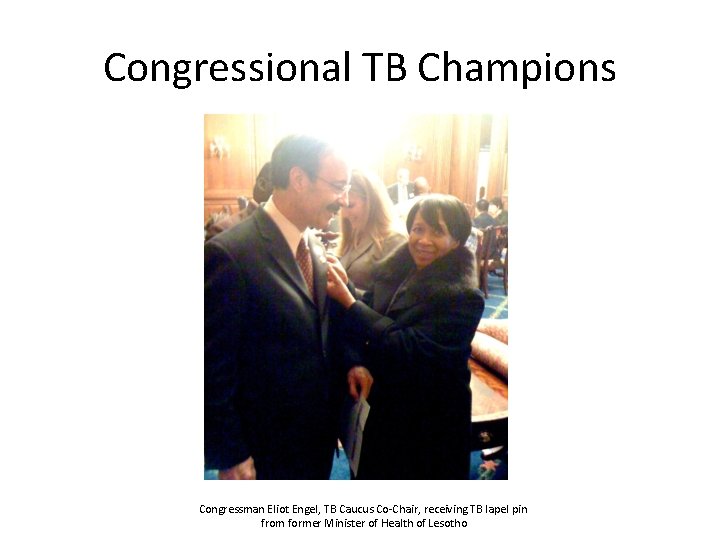 Congressional TB Champions Congressman Eliot Engel, TB Caucus Co-Chair, receiving TB lapel pin from