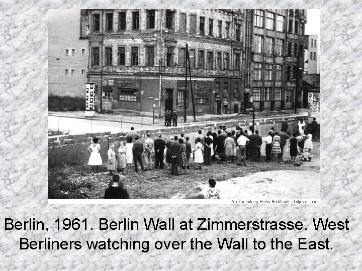 Berlin, 1961. Berlin Wall at Zimmerstrasse. West Berliners watching over the Wall to the