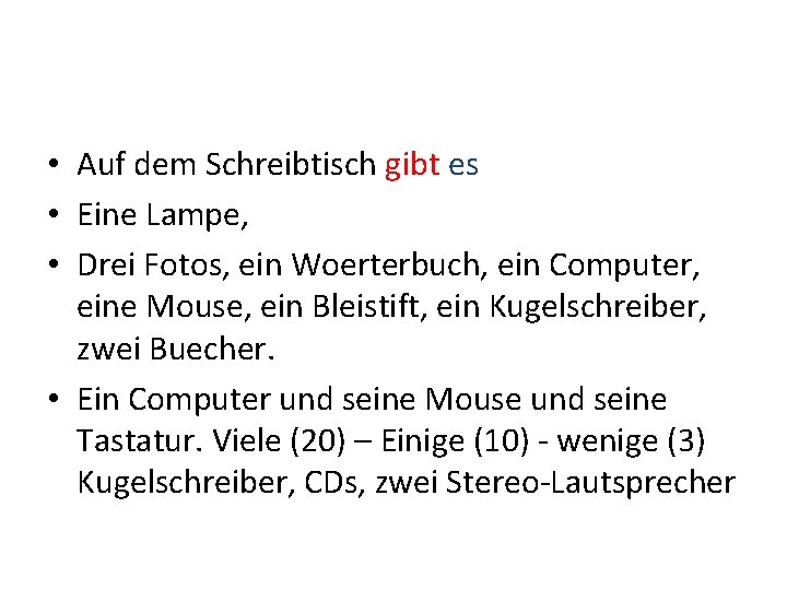  • Auf dem Schreibtisch gibt es • Eine Lampe, • Drei Fotos, ein