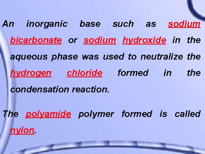 An inorganic base such as sodium bicarbonate or sodium hydroxide in the aqueous phase