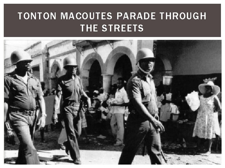 TONTON MACOUTES PARADE THROUGH THE STREETS 