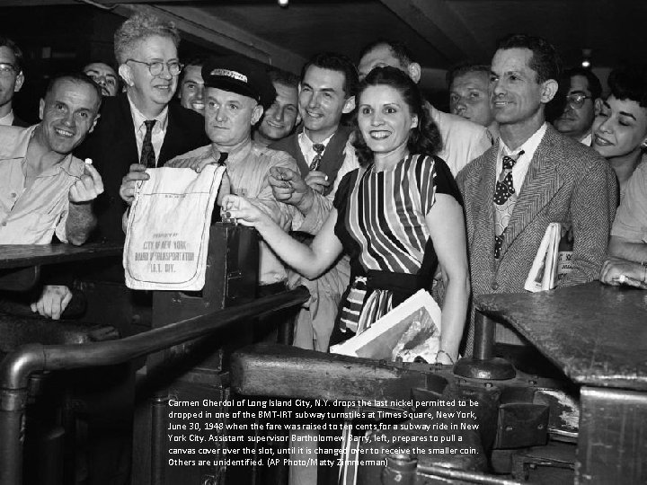 Carmen Gherdol of Long Island City, N. Y. drops the last nickel permitted to