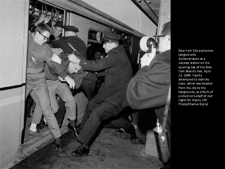 New York City policemen tangled with demonstrators at a subway station on the opening