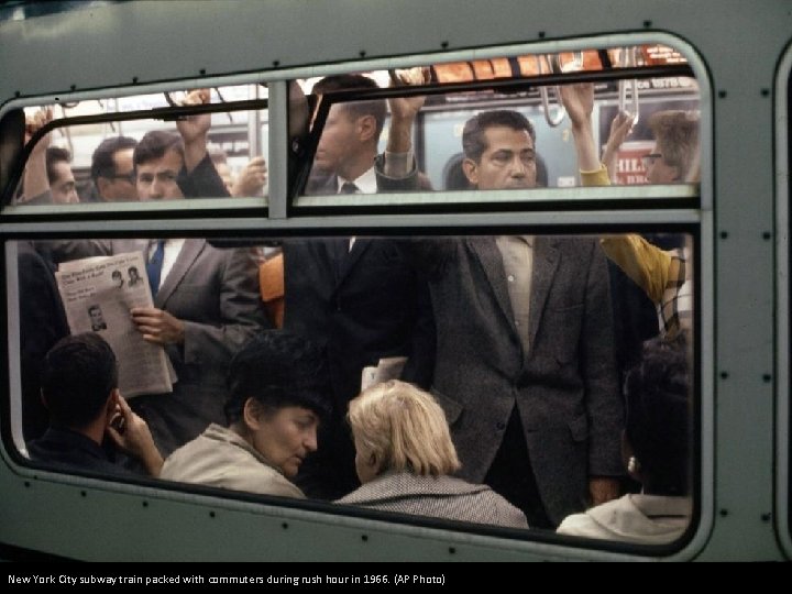 New York City subway train packed with commuters during rush hour in 1966. (AP