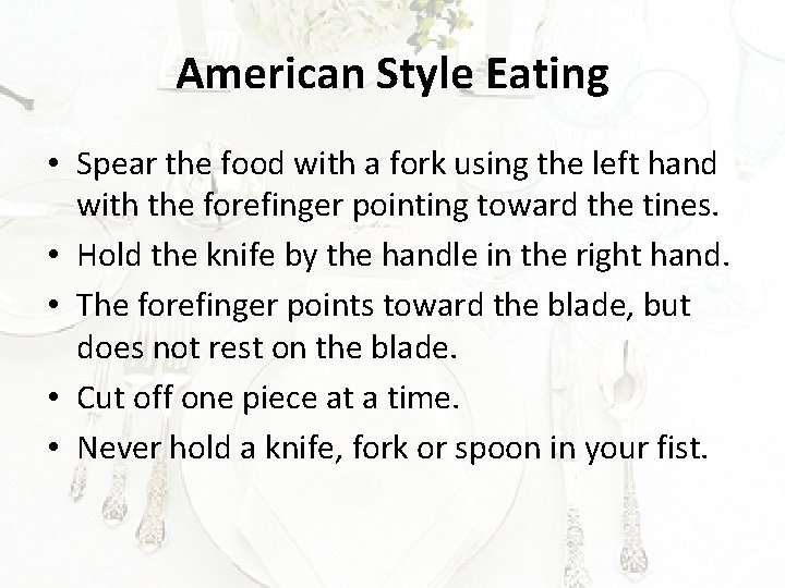 American Style Eating • Spear the food with a fork using the left hand