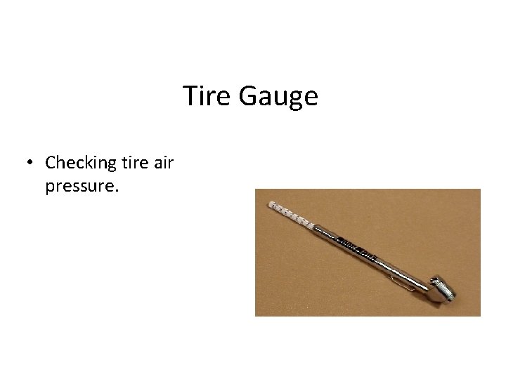 Tire Gauge • Checking tire air pressure. 