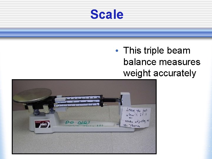 Scale • This triple beam balance measures weight accurately 