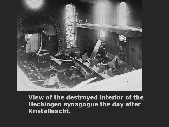 View of the destroyed interior of the Hechingen synagogue the day after Kristallnacht. 
