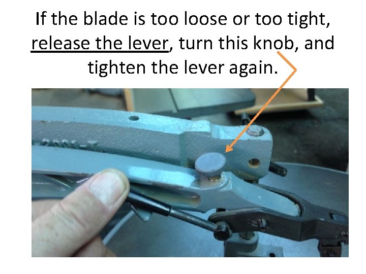 If the blade is too loose or too tight, release the lever, turn this