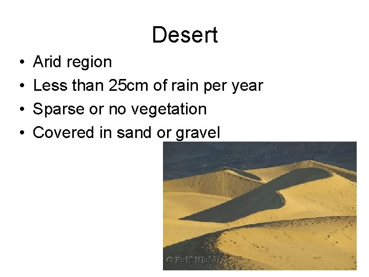 Desert • • Arid region Less than 25 cm of rain per year Sparse