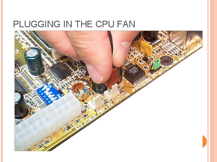 PLUGGING IN THE CPU FAN 