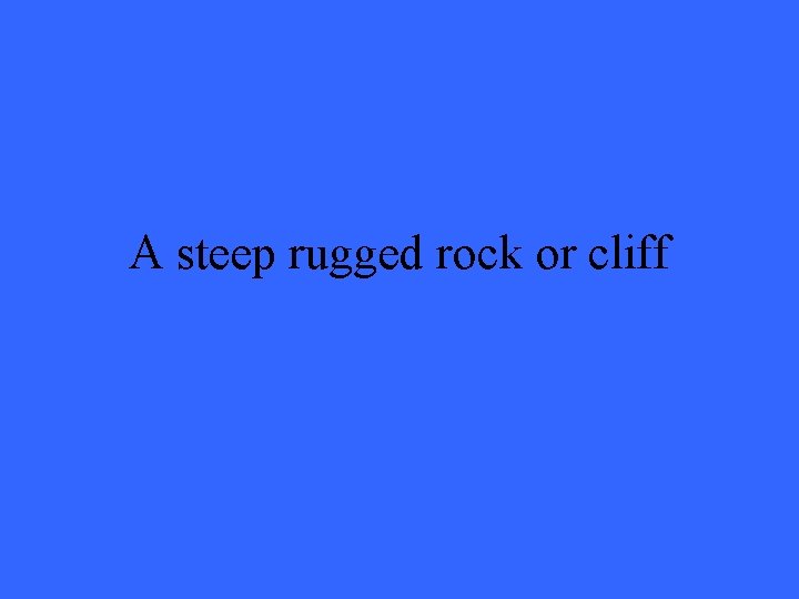 A steep rugged rock or cliff 