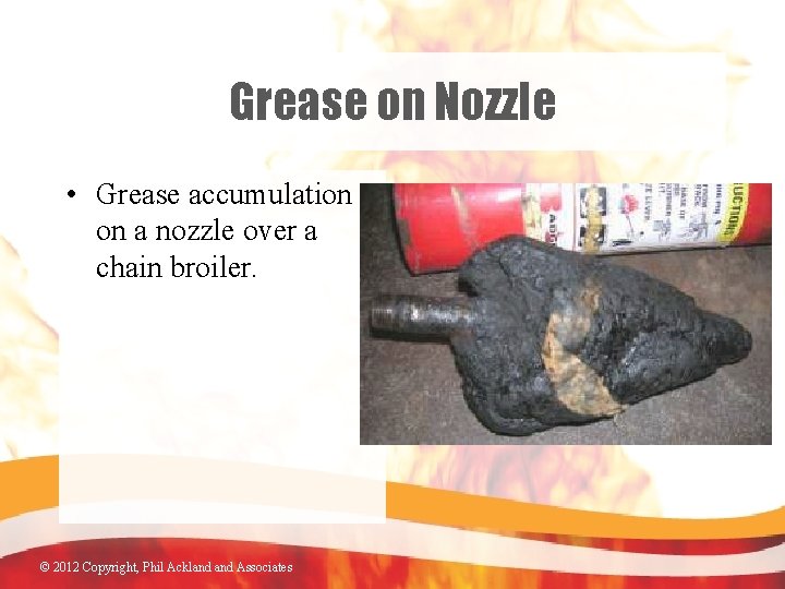 Grease on Nozzle • Grease accumulation on a nozzle over a chain broiler. ©