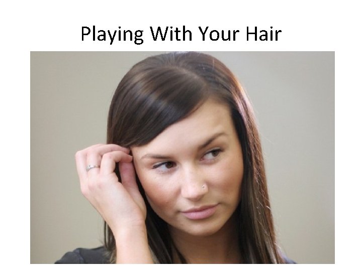 Playing With Your Hair • “It’s a stress comfort cue that can make you
