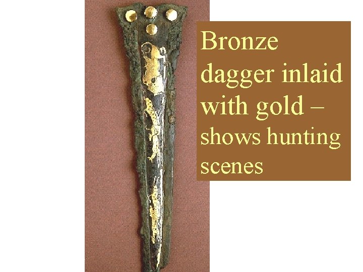 Bronze dagger inlaid with gold – shows hunting scenes 