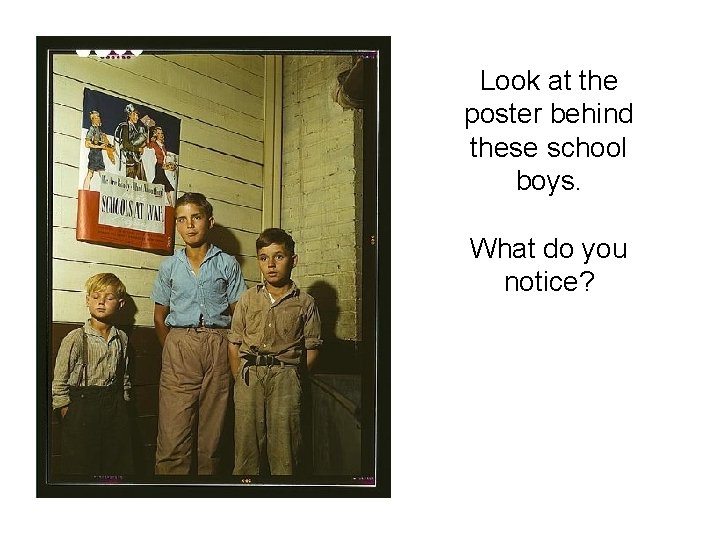 Look at the poster behind these school boys. What do you notice? 