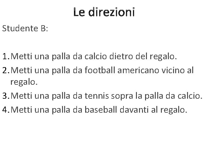 Le direzioni Studente B: 1. Metti una palla da calcio dietro del regalo. 2.