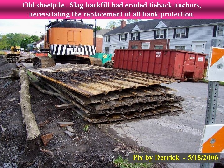 Old sheetpile. Slag backfill had eroded tieback anchors, necessitating the replacement of all bank