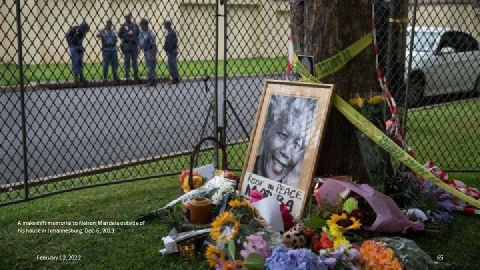 A makeshift memorial to Nelson Mandela outside of his house in Johannesburg, Dec. 6,