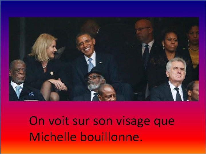 On voit sur son visage que Michelle bouillonne. 