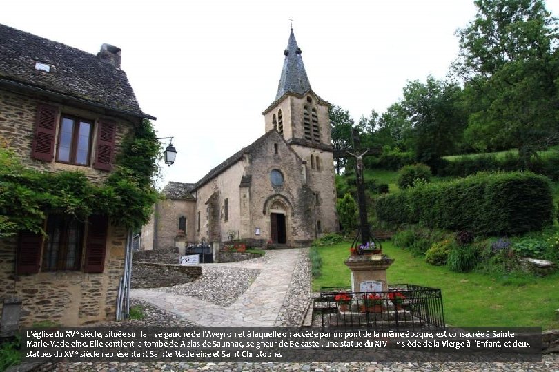 L’église du XV e siècle, située sur la rive gauche de l’Aveyron et à