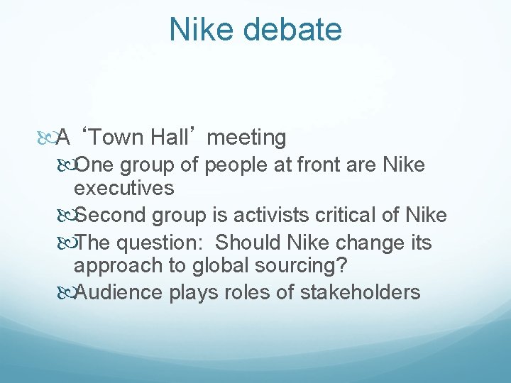 Nike debate A ‘Town Hall’ meeting One group of people at front are Nike