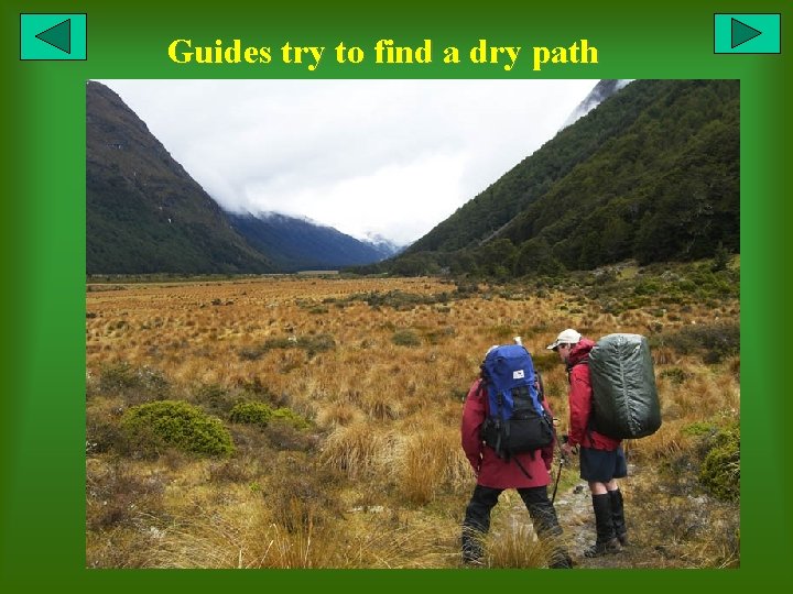 Guides try to find a dry path 