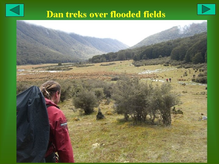 Dan treks over flooded fields 