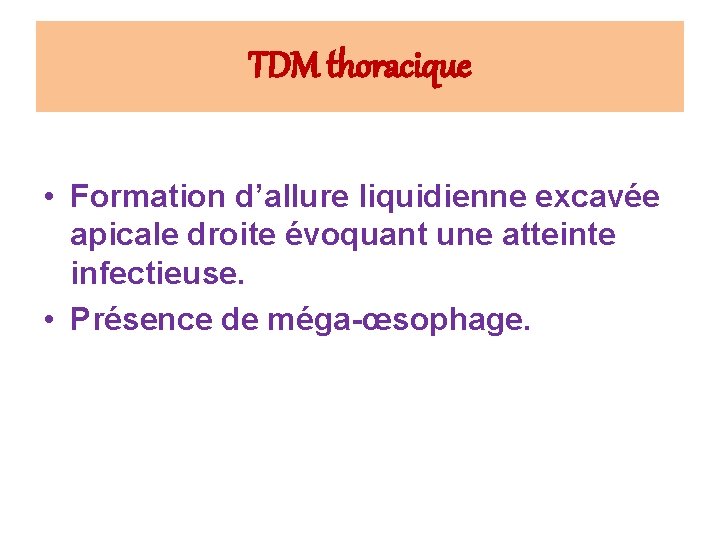 TDM thoracique • Formation d’allure liquidienne excavée apicale droite évoquant une atteinte infectieuse. •