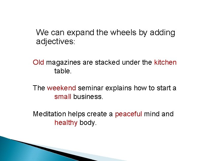 We can expand the wheels by adding adjectives: Old magazines are stacked under the