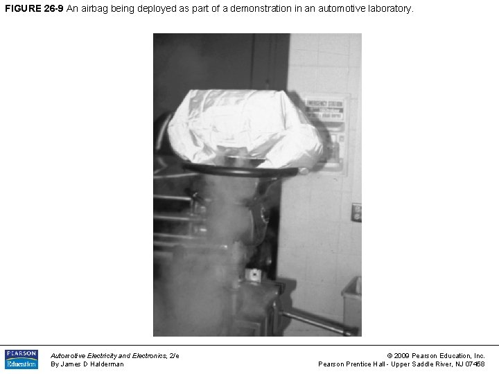 FIGURE 26 -9 An airbag being deployed as part of a demonstration in an